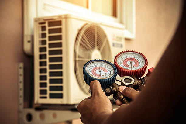 Professional Hvac technician working in Bastrop, LA